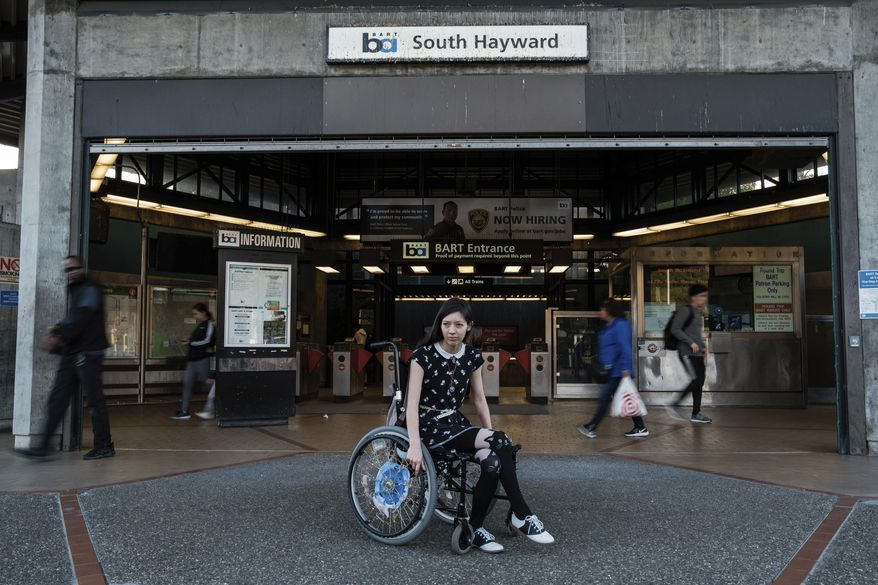In this Thursday, Nov. 21, 2019 photo, Sophia Humphrey poses for a portrait at the South Hayward Bart Station in Hayward, Calif. Humphrey witnessed the killing of a good Samaritan on a San Francisco Bay Area commuter train. (Nick Otto/San Francisco Chronicle via AP)