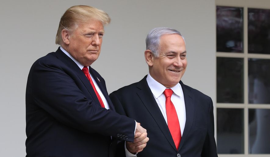 In this March 25, 2019, file photo, President Donald Trump welcomes visiting Israeli Prime Minister Benjamin Netanyahu to the White House in Washington.  (AP Photo/Manuel Balce Ceneta, File) **FILE**