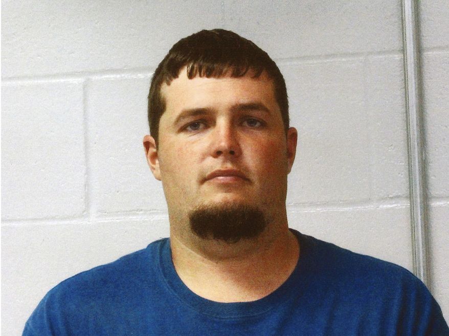 FILE - This undated file photo provided by the Caldwell County, Mo., Detention Center shows Garland Nelson. Northwest Missouri authorities say human remains found in Missouri and Nebraska are those of two missing brothers from Wisconsin. Caldwell County Sheriff Jerry Galloway announced in a news release Friday, Nov. 22, 2019, that remains found Monday in a livestock trailer in Lincoln County, Nebraska, are those of 24-year-old Justin Diemel, and remains recovered from a farm in Caldwell County, Missouri, are those of 35-year-old Nicholas Diemel. The brothers, from Shawano County, Wisconsin, were reported missing July 21. Nelson, of Braymer, Missouri, is charged with two counts of first-degree murder and other charges in the brothers’ deaths. (Caldwell County Detention Center via AP, File)