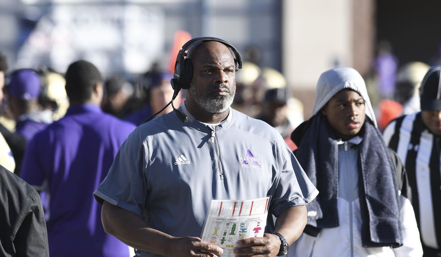 Alcorn State head coach Fred McNair watches as player line up for a play during the first half of an NCAA college football game against Jackson State in Jackson, Miss., Saturday, Nov. 23, 2019. (Courtland Wells/The Vicksburg Post via AP)