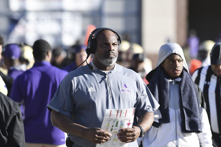 Alcorn State head coach Fred McNair watches as player line up for a play during the first half of an NCAA college football game against Jackson State in Jackson, Miss., Saturday, Nov. 23, 2019. (Courtland Wells/The Vicksburg Post via AP)