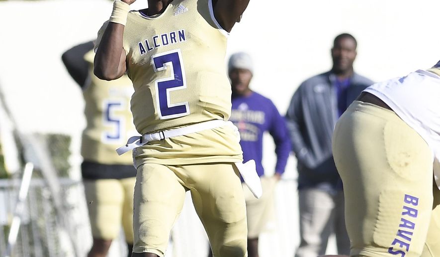Alcorn State quarterback Felix Harper (2) releases a pass against Jackson State during the first half of an NCAA college football game in Jackson, Miss., Saturday, Nov. 23, 2019. (Courtland Wells/The Vicksburg Post via AP)