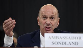 In this Nov. 20, 2019, photo, U.S. Ambassador to the European Union Gordon Sondland testifies before the House Intelligence Committee on Capitol Hill in Washington, during a public impeachment hearing of President Donald Trump&#39;s efforts to tie U.S. aid for Ukraine to investigations of his political opponents. (AP Photo/Susan Walsh)