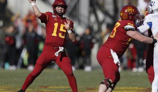 Iowa State quarterback Brock Purdy drops back to pass during the first half of an NCAA college football game against Kansas, Saturday, Nov. 23, 2019, in Ames, Iowa. (AP Photo/Matthew Putney)