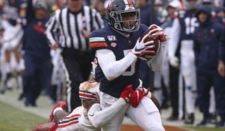 Virginia&#39;s Lamont Atkins (5) scores a touchdown against Liberty during an NCAA college football game Saturday, Nov. 23, 2019, in Charlottesville, Va. (Erin Edgerton/The Daily Progress via AP)