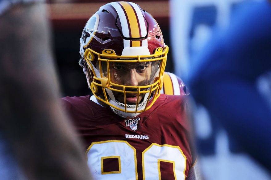 Washington Redskins linebacker Montez Sweat looks across the line of scrimmage during an NFL football game against the Detroit Lions, Sunday, Nov. 24, 2019, in Landover, Md. (AP Photo/Mark Tenally)