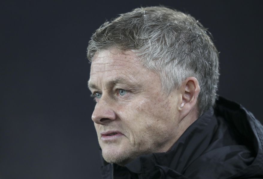 Manchester United's manager Ole Gunnar Solskjaer looks on before the English Premier League soccer match between Sheffield United and Manchester United at Bramall Lane Stadium in Sheffield, England, Sunday, Nov. 24, 2019. (AP Photo/Jon Super)