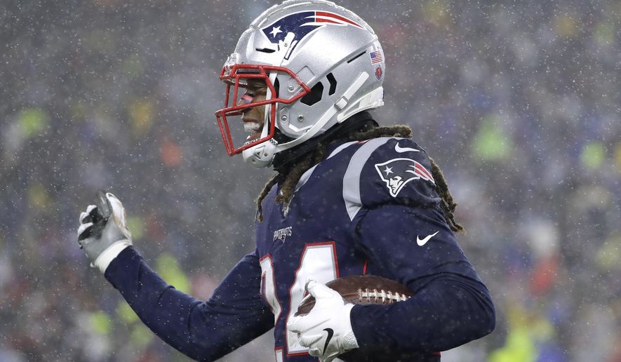 New England Patriots cornerback Stephon Gilmore celebrates his interception against the Dallas Cowboys in the first half of an NFL football game, Sunday, Nov. 24, 2019, in Foxborough, Mass. (AP Photo/Steven Senne)
