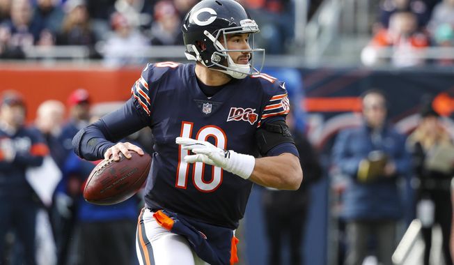 Chicago Bears quarterback Mitchell Trubisky (10) looks tothrow against the New York Giants during the first half of an NFL football game in Chicago, Sunday, Nov. 24, 2019. (AP Photo/Charles Rex Arbogast)