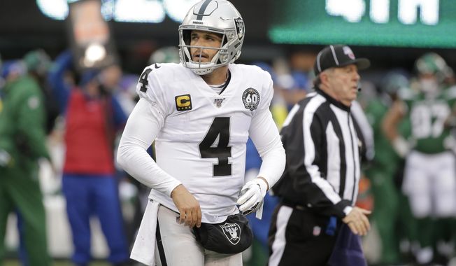 Oakland Raiders quarterback Derek Carr reacts during the second half of an NFL football game against the New York Jets, Sunday, Nov. 24, 2019, in East Rutherford, N.J. (AP Photo/Seth Wenig)