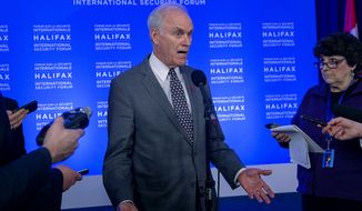 In this Saturday, Nov. 23, 2019 photo, U.S. Navy Secretary Richard Spencer fields questions at a media availability at the Halifax International Security Forum in Halifax, Nova Scotia. U.S. Defense Secretary Mark Esper has fired the Navy’s top official over his handling of the case of a SEAL accused of war crimes who President Donald Trump has defended. Esper said on Sunday, Nov. 24 that he had lost confidence in Spencer and alleged that Spencer proposed a deal with the White House behind his back to resolve the SEAL’s case. (Andrew Vaughan/The Canadian Press via AP)