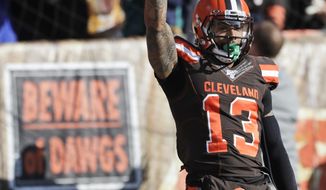 Cleveland Browns wide receiver Odell Beckham Jr. (13) celebrates after a touchdown during the first half of an NFL football game against the Miami Dolphins, Sunday, Nov. 24, 2019, in Cleveland. (AP Photo/Ron Schwane)