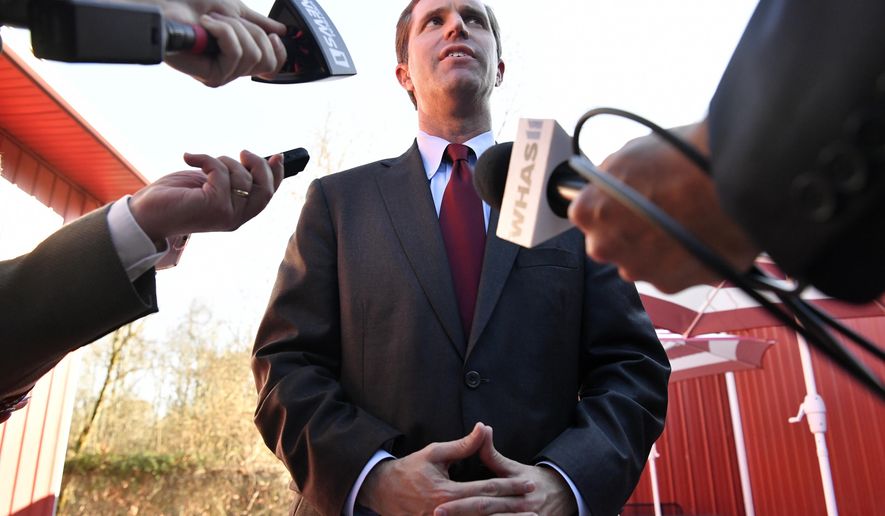 Kentucky governor-elect Andy Beshear speaks with reporters following the dedication ceremony of a Recovery Community Center in in Manchester, Ky., Monday, Nov. 25, 2019. (AP Photo/Timothy D. Easley)
