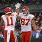 Kansas City Chiefs tight end Travis Kelce, right, celebrates with teammate wide receiver Demarcus Robinson after scoring a touchdown during the second half of an NFL football game against the Los Angeles Chargers, Monday, Nov. 18, 2019, in Mexico City. (AP Photo/Rebecca Blackwell)