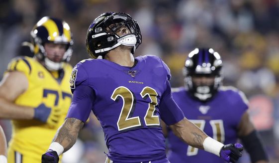 Baltimore Ravens cornerback Jimmy Smith celebrates after sacking Los Angeles Rams quarterback Jared Goff during the first half of an NFL football game Monday, Nov. 25, 2019, in Los Angeles. (AP Photo/Marcio Jose Sanchez) **FILE**