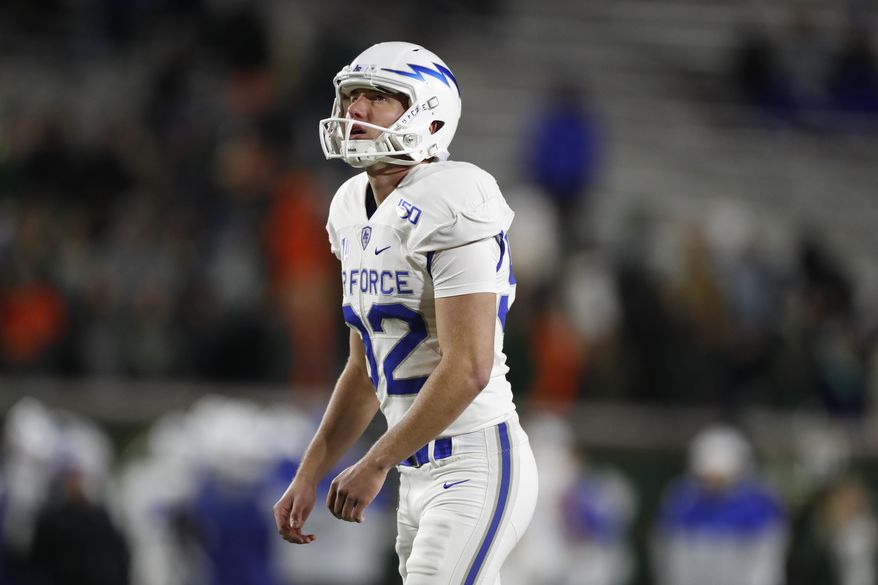In this Saturday, Nov. 16, 2019, photo, Air Force place kicker Jake Koehnke lines up an extra-point attempt against Colorado State in the second half of an NCAA football game in Fort Collins, Colo. Koehnke hasn’t missed a beat all season _ or so much as a field goal. (AP Photo/David Zalubowski)