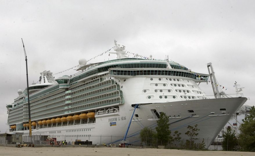 FILE - This May 11, 2006 file photo shows the Freedom of the Seas cruise ship docked in Bayonne, N.J. An Indiana man charged with negligent homicide in his granddaughter's fatal plunge from a cruise ship docked in Puerto Rico insists that he didn't realize an 11th-floor window was open before the 18-month-old fell to her death in July. Salvatore Anello of Valparaiso tells "CBS This Morning" that Chloe Wiegand fell after he lifted her to a window on the Royal Caribbean's Freedom of the Seas so she could bang on the glass like she did at hockey games. (AP Photo/Mike Derer, File)