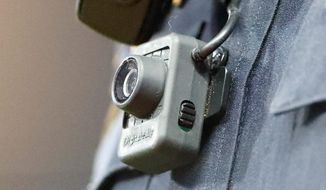 Under a pilot program, agents who operate as part of U.S. Immigration and Customs Enforcement’s SWAT team in Houston, New York City and Newark, New Jersey, will be outfitted with the cameras. (Associated Press)