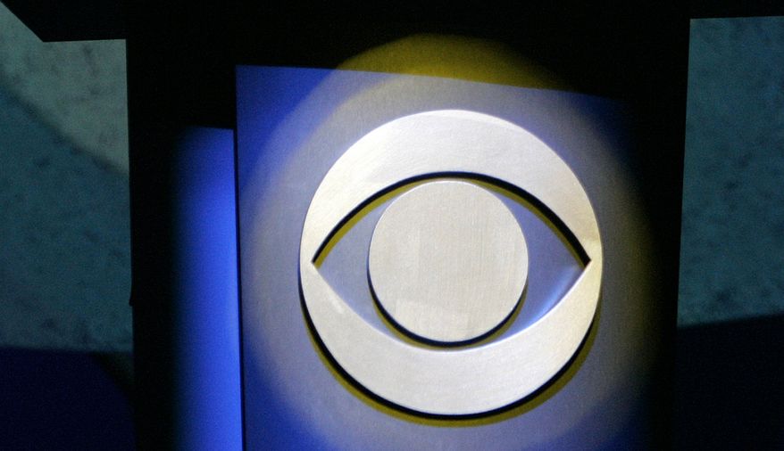 In this file photo taken Jan. 9, 2007, a CBS Corp. logo is silhouetted in Las Vegas. (AP Photo/Jae C. Hong, file)