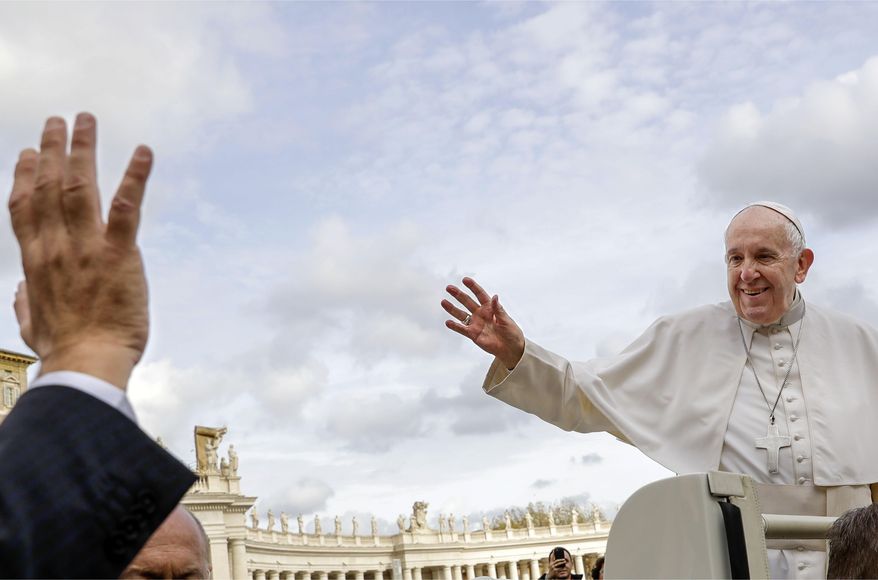 Pope Francis, right, waves as he leaves at the end of his weekly general audience, in St. Peter's Square at the Vatican, Wednesday, Nov. 27, 2019. (AP Photo/Andrew Medichini) **FILE**