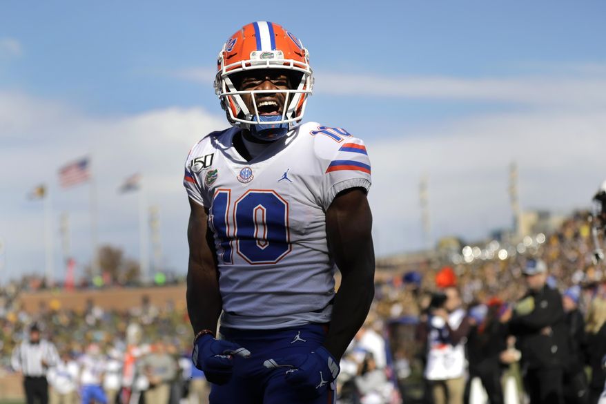 Florida wide receiver Josh Hammond celebrates after catching a touchdown pass during the second half of an NCAA college football game against Missouri Saturday, Nov. 16, 2019, in Columbia, Mo. Florida won 23-6. (AP Photo/Jeff Roberson)