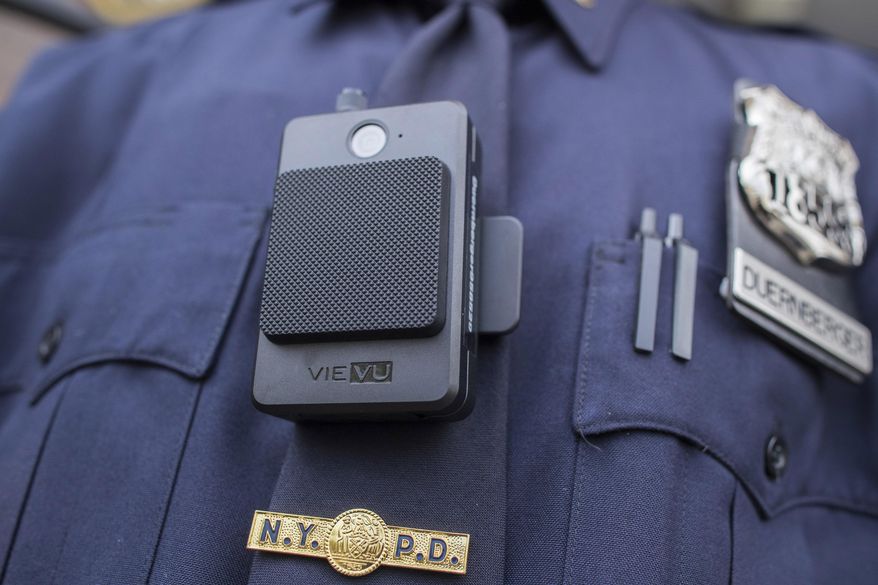 In this April 27, 2017, photo, a police officer wears a newly issued body camera in New York. (AP Photo/Mary Altaffer) **FILE**