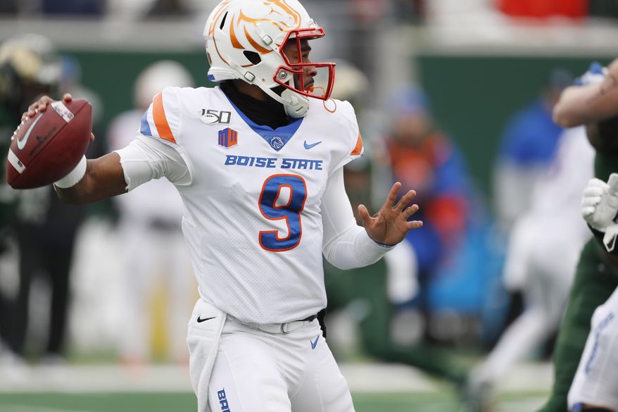 Boise State quarterback Jaylon Henderson looks to pass against Colorado State during the first half of an NCAA college football game Friday, Nov. 29, 2019, in Fort Collins, Colo. (AP Photo/David Zalubowski)