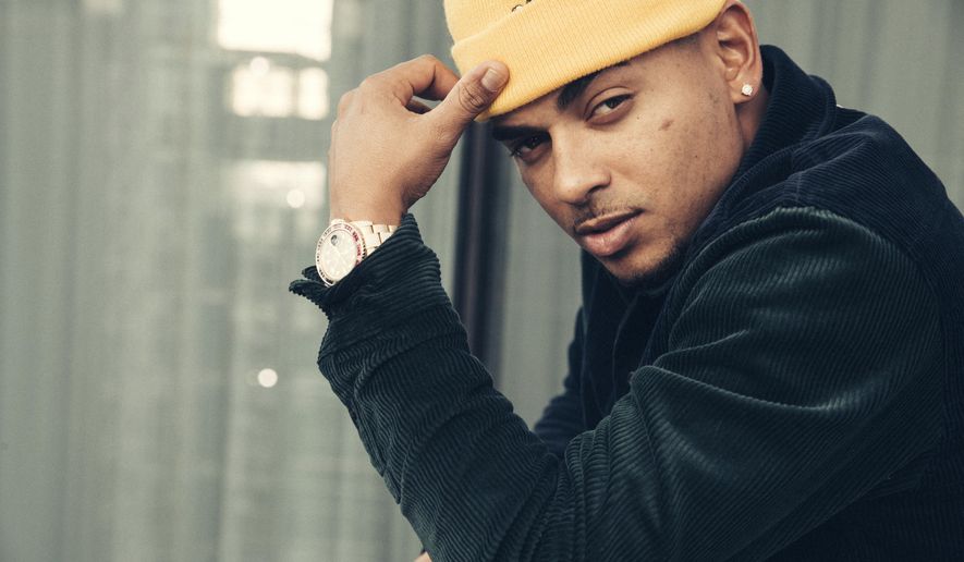 This Nov. 25, 2019, photo shows Latin singer Ozuna posing for a portrait in New York to promote his latest album "Nibiru," which will be released on Friday, Nov. 29. (Photo by Victoria Will/Invision/AP)