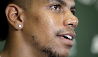 FILE - In this July 27, 2018, file photo, New York Jets wide receiver Terrelle Pryor talks to reporters during NFL football training camp in Florham Park, N.J. Allegheny County, Pa., District Attorney spokesman Mike Manko confirmed Saturday, Nov. 30, 2019, that Pryor, a free agent, was the victim of a stabbing, but said he had no other information, such as Pryor’s condition or where and when the stabbing occurred.  (AP Photo/Julio Cortez, File)