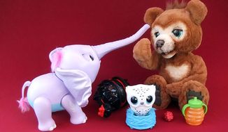 Coolest interactive creatures for gifting include The Alpha Group&#x27;s Grrrumball, Spin Master&#x27;s Owleez and Juno and Hasbro&#x27;s Cubby (Photograph by Joseph Szadkowski / The Washington Times)
