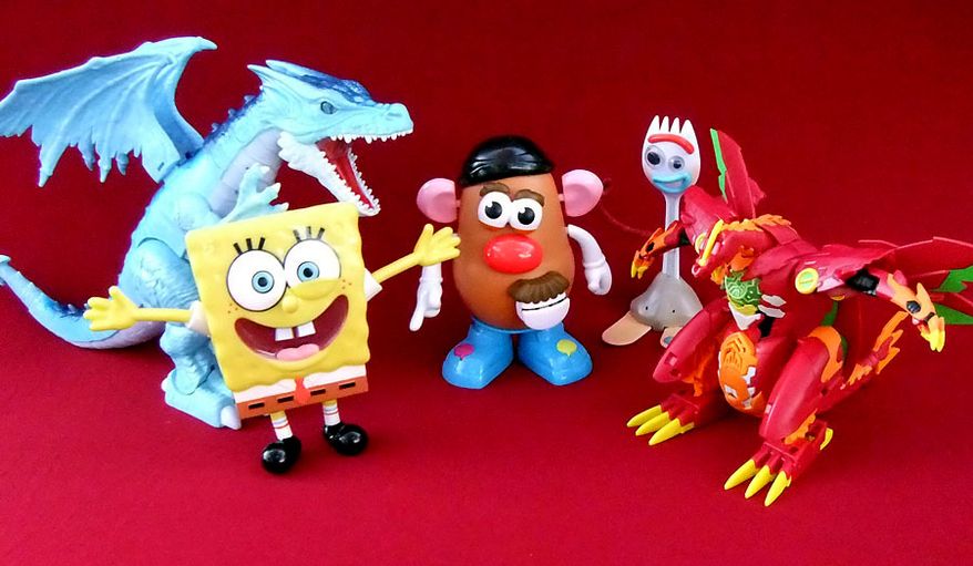 Chatty toy companion gift ideas include Alpha Group&#39;s SpongeBob StretchPants, Playskool&#39;s Movin&#39; Lips Mr. Potato Head, Zuru&#39;s Ice Blasting Dragon and Disney&#39;s Forky.  (Photograph by Joseph Szadkowski / The Washington Times)