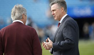 Washington Redskins general manager Bruce Allen, right, is seen prior to an NFL football game between the Carolina Panthers and the Washington Redskins in Charlotte, N.C., Sunday, Dec. 1, 2019. (AP Photo/Brian Blanco) ** FILE **