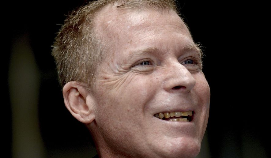 Australian Timothy Weeks smiles during a press conference in Sydney, Sunday, Sunday, Dec. 1, 2019.  The Australian teacher held captive with an American colleague by the Taliban for more than three years believes U.S. Navy SEALs tried and failed six times to free them. Weeks was released last month in a prisoner swap along with American Kevin King, ending an ordeal that began with their 2016 abduction outside the American University in Kabul, where they worked. (Jeremy Piper/AAPImage via AP)
