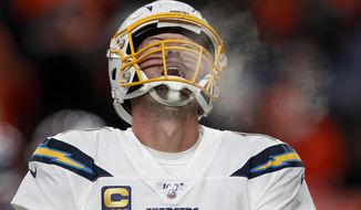 Los Angeles Chargers quarterback Philip Rivers reacts during the second half of an NFL football game against the Denver Broncos Sunday, Dec. 1, 2019, in Denver. Denver Broncos won 23-20. (AP Photo/David Zalubowski)