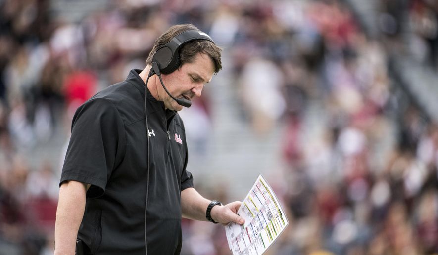 South Carolina head coach Will Muschamp walks on the sideline during the second half of an NCAA college football game against Clemson, Saturday, Nov. 30, 2019, in Columbia, S.C. Clemson defeated South Carolina 38-3. (AP Photo/Sean Rayford)