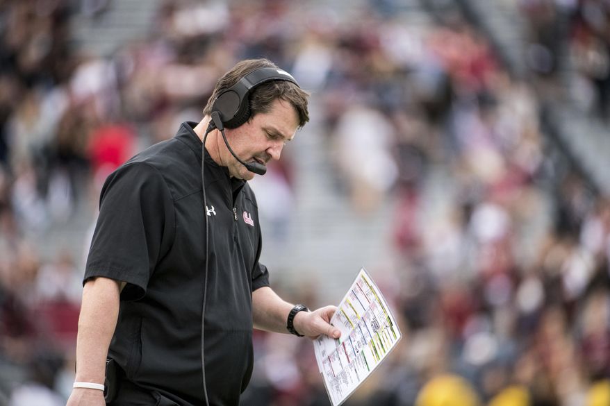 South Carolina head coach Will Muschamp walks on the sideline during the second half of an NCAA college football game against Clemson, Saturday, Nov. 30, 2019, in Columbia, S.C. Clemson defeated South Carolina 38-3. (AP Photo/Sean Rayford)