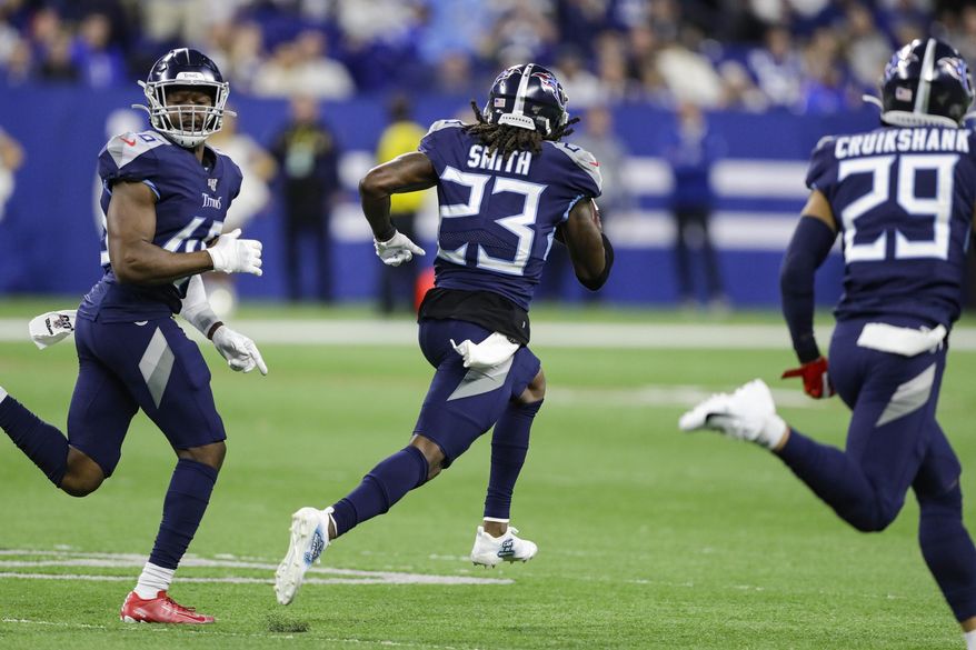 Tennessee Titans cornerback Tye Smith (23) runs back a blocked field goal for a touchdown against the Indianapolis Colts during the second half of an NFL football game in Indianapolis, Sunday, Dec. 1, 2019. (AP Photo/Darron Cummings)