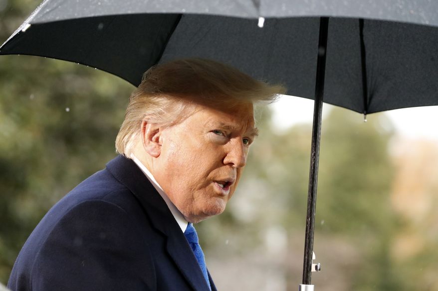 President Donald Trump speaks with reporters on the South Lawn of the White House before departing, Monday, Dec. 2, 2019, in Washington. (AP Photo/Alex Brandon)