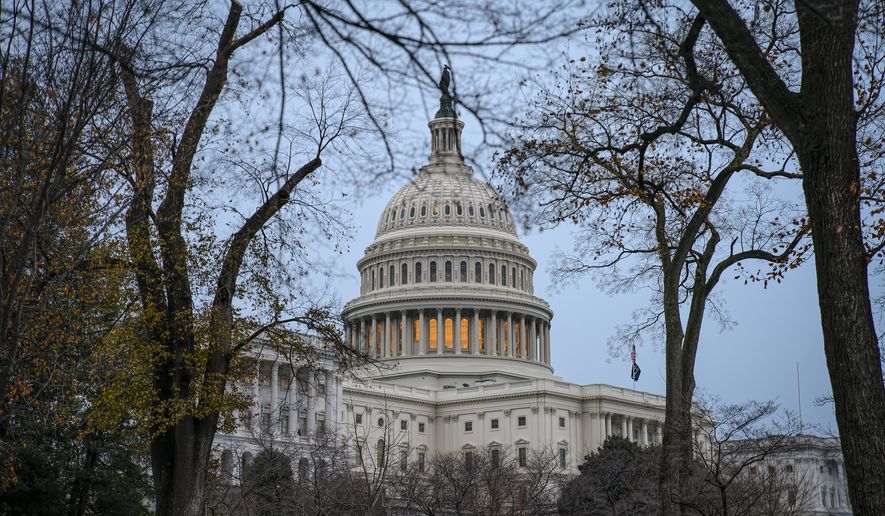 The Capitol is seen in Washington, Monday, Dec. 2, 2019, as lawmakers return from the Thanksgiving recess. The House impeachment report on President Donald Trump will be unveiled Monday behind closed doors as Democrats push ahead with the inquiry despite the White House&#39;s declaration it will not participate in the first Judiciary Committee hearing. (AP Photo/J. Scott Applewhite)