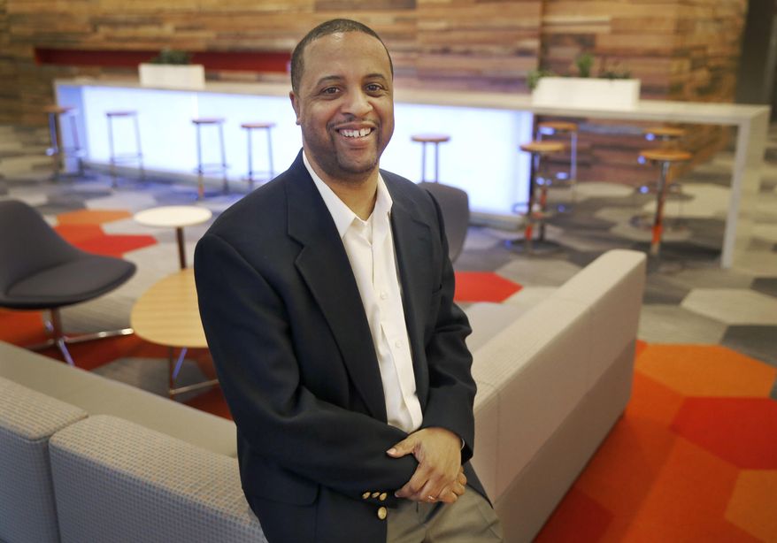 In this Jan. 11, 2016 photo, Associated Press editor Andale Gross poses for a photo in Chicago. The AP announced Monday, Dec. 2, 2019, that it has named Gross as the new editor of its Race and Ethnicity team. (AP Photo/Charles Rex Arbogast)