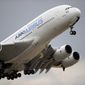 FILE - In this June 18, 2015, file photo, an Airbus A380 takes off for its demonstration flight at the Paris Air Show in Le Bourget airport, north of Paris. A World Trade Organization panel ruled Monday, Dec. 2, 2019, that the European Union has not complied with an order to end illegal subsidies for plane-maker Airbus, which prompted the Trump administration to impose tariffs on nearly $7.5 billion worth of EU goods in October. (AP Photo/Francois Mori, File)