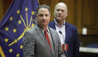 State Rep. Todd Huston speaks during a news conference at the Statehouse, Monday, Dec. 2, 2019, in Indianapolis. Republican legislators selected State Rep. Huston as their pick to become the next leader of the Indiana House. (AP Photo/Darron Cummings)