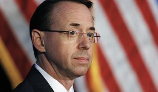 FILE - In this June 20, 2017, file photo, Deputy Attorney General Rod Rosenstein listens during the Justice Department&#39;s National Summit on Crime Reduction and Public Safety in Bethesda, Md. Former Deputy Attorney General Rosenstein told the FBI he was &amp;quot;angry, ashamed, horrified and embarrassed&amp;quot; at the way James Comey was fired as FBI director. An FBI summary of that interview was among hundreds of pages of documents released Monday, Dec. 2, 2019, as part of a public records lawsuit brought by BuzzFeed News and CNN. (AP Photo/Jacquelyn Martin, File)