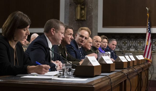 Government Accountability Office, defense capabilities and management director Elizabeth Field, left, Army Secretary Ryan McCarthy, Army Chief of Staff Gen. James McConville, Acting Navy Secretary Thomas Modly, Chief of Naval Operations Adm. Michael Gilday, Marine Corps Commandant Gen. David Berger, Air Force Secretary Barbara Barrett, and Air Force Chief of Staff David Goldfein testify during a hearing of the Senate Armed Services Committee about about ongoing reports of substandard housing conditions Tuesday, Dec. 3, 2019 in Washington, on Capitol Hill. (AP Photo/Alex Brandon)