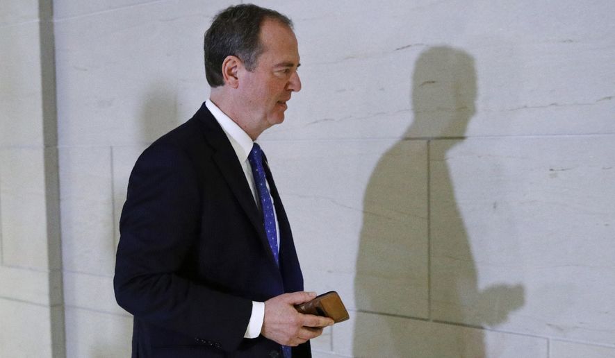 Rep. Adam Schiff, D-Calif., Chairman of the House Intelligence Committee, departs a secure area of the Capitol in Washington, Tuesday, Dec. 3, 2019. The Democrats on the House Intelligence Committee have released a sweeping impeachment report outlining evidence of what it calls President Donald Trump&#x27;s wrongdoing toward Ukraine. (AP Photo/Patrick Semansky)