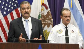 Former Los Angeles Police Chief Charlie Beck, left, who was named interim police superintendent in Chicago by Mayor Lori Lightfoot, addresses a news conference where he fielded questions on the firing by Lightfoot of retiring superintendent Eddie Johnson and Facebook gun sales Tuesday, Dec. 3, 2019. Standing with Beck is First Deputy Superintendent Anthony Riccio, as the pair announced that investigators have arrested more than 50 people accused of using private Facebook groups and messages to sell guns or drugs. Police also blamed the social media company for complicating such cases by taking down investigators&#x27; fake profiles during a Tuesday press conference announcing results of the two-year investigation. (AP Photo/Teresa Crawford)
