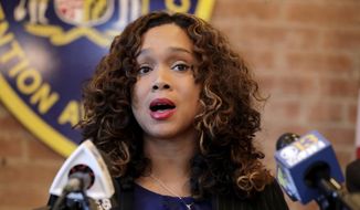 Maryland State Attorney Marilyn Mosby speaks during a news conference announcing the indictment of correctional officers, Tuesday, Dec. 3, 2019, in Baltimore. (AP Photo/Julio Cortez) ** FILE **