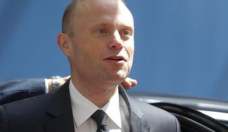FILE - In this Thursday, June 20, 2019 file photo, Malta&#39;s Prime Minister Joseph Muscat arrives for an EU summit at the Europa building in Brussels. Maltese Prime Minister Joseph Muscat said Sunday Dec. 1, 2019, that he would resign in January following pressure from citizens for the truth about the 2017 car bombing that killed a journalist. (Julien Warnand/Pool via AP, File)