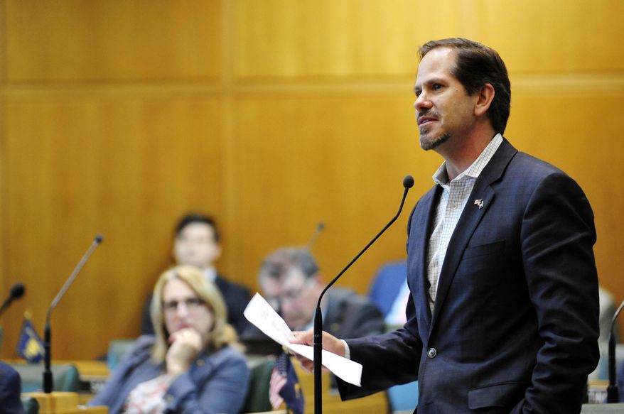 FILE - In this May 21, 2018, file photo, Oregon Republican Rep. Knute Buehler speaks in the House chamber during a special legislative session in Salem, Ore. A leading Republican in Oregon announced Tuesday, Dec. 3, 2019, he will dump campaign contributions from Gordon Sondland after sexual misconduct allegations against the Portland businessman-turned-diplomat surfaced last week. Buehler, who ran unsuccessfully as the Republican nominee for governor of Oregon in 2018 and is considering a run for Congress in 2020, said he and his wife Patty were disturbed by the allegations. (AP Photo/Tom James, File)