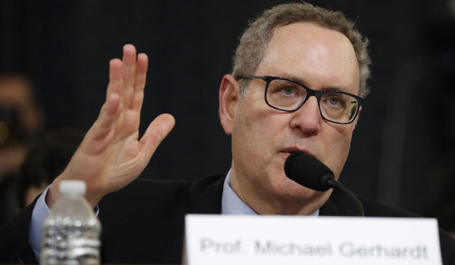 Constitutional law experts University of North Carolina Law School professor Michael Gerhardt testifies during a hearing before the House Judiciary Committee on the constitutional grounds for the impeachment of President Donald Trump, Wednesday, Dec. 4, 2019, on Capitol Hill in Washington. (AP Photo/Jacquelyn Martin)